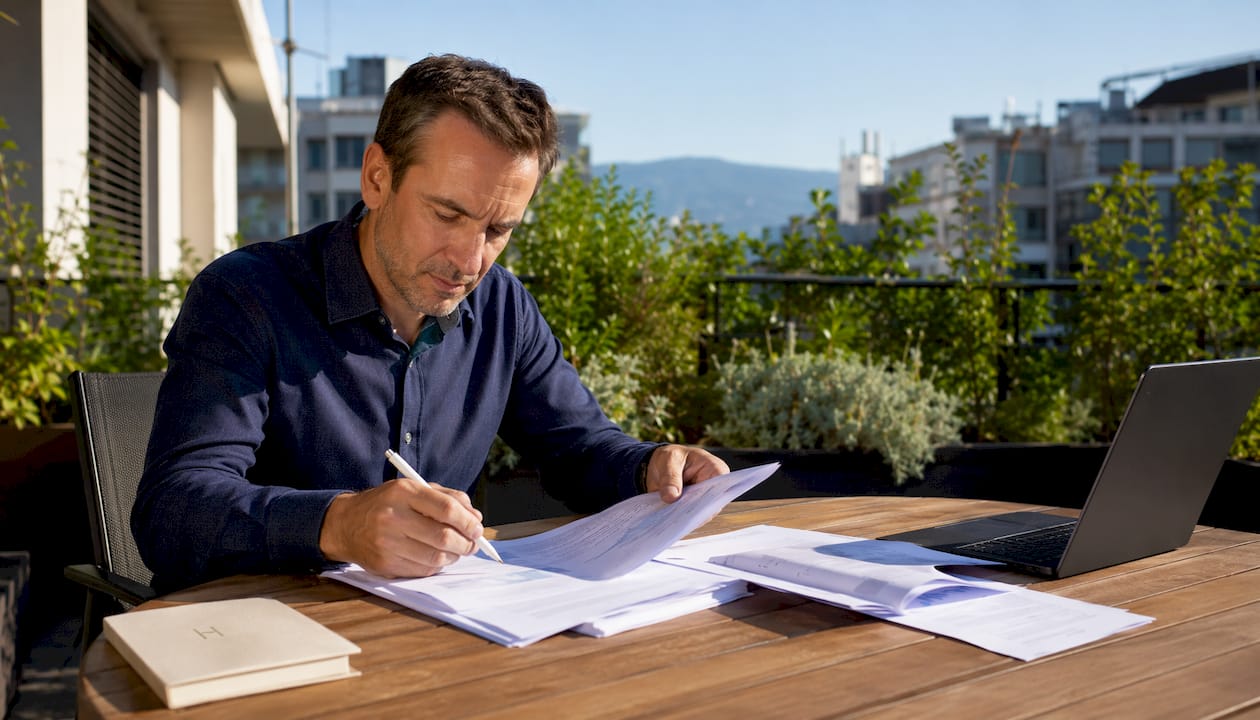 Property owner reviewing all the necessary documentation for a change of land use.