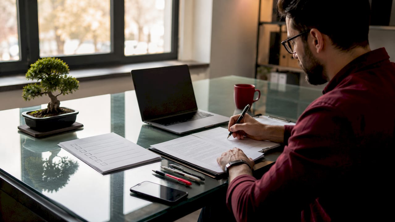 Overhead view of content production materials on desk