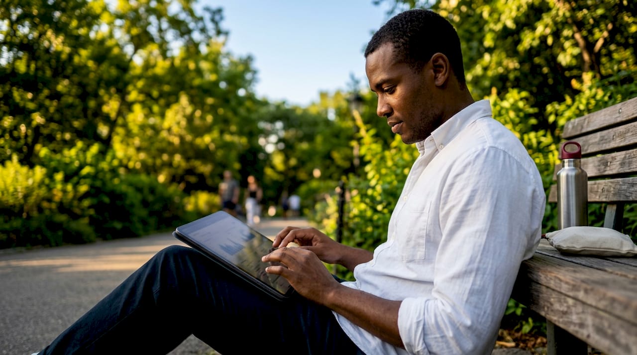 Hands adjusting conversion optimisation on tablet