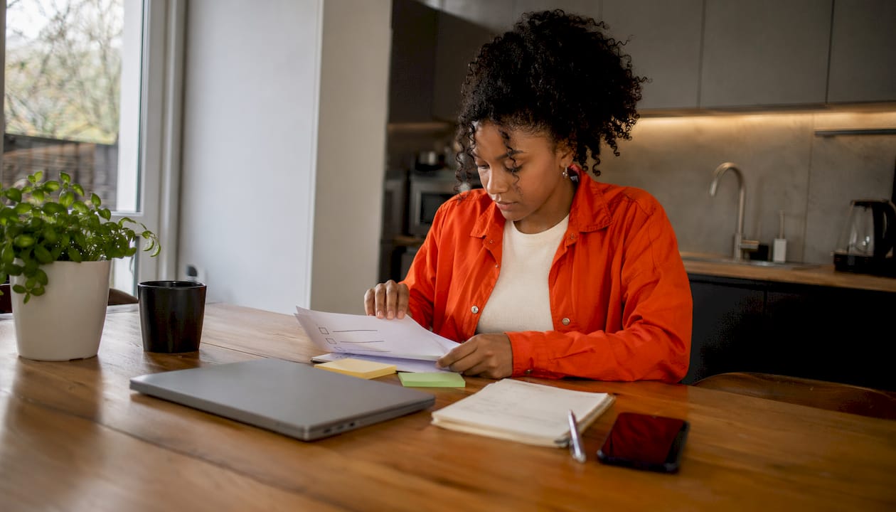 Hands adjusting Google Business Profile checklist