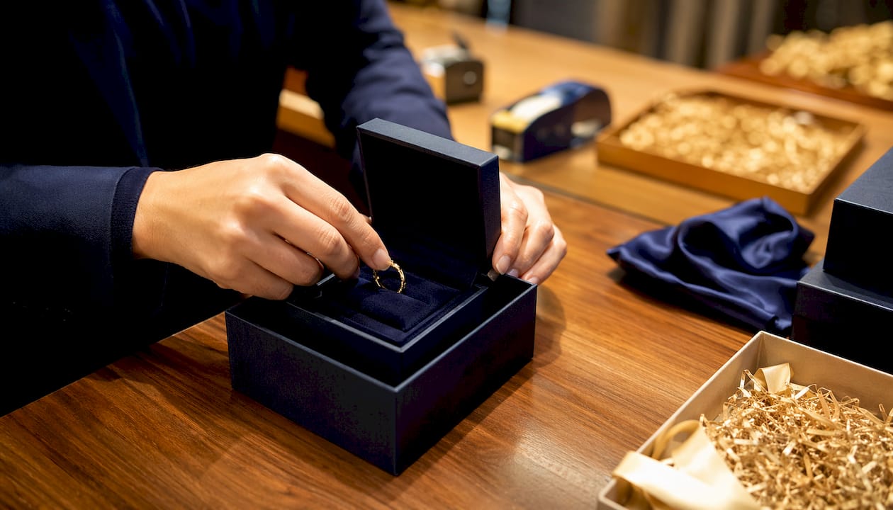 Hands packing ring securely for shipping