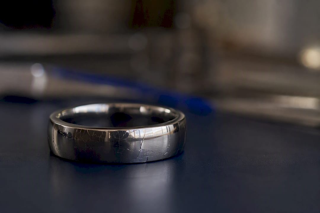 Tungsten carbide ring close-up showing polish and fragility