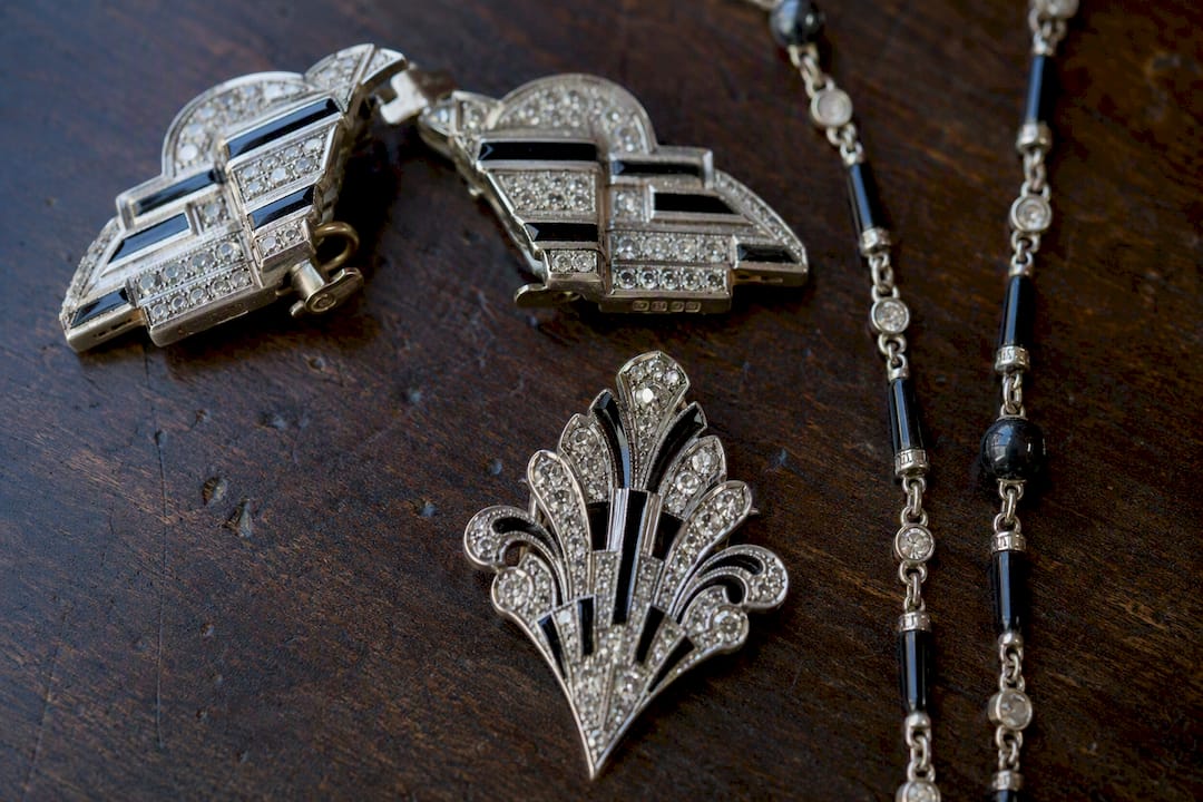 Detailed Art Deco jewellery motifs and gemstones