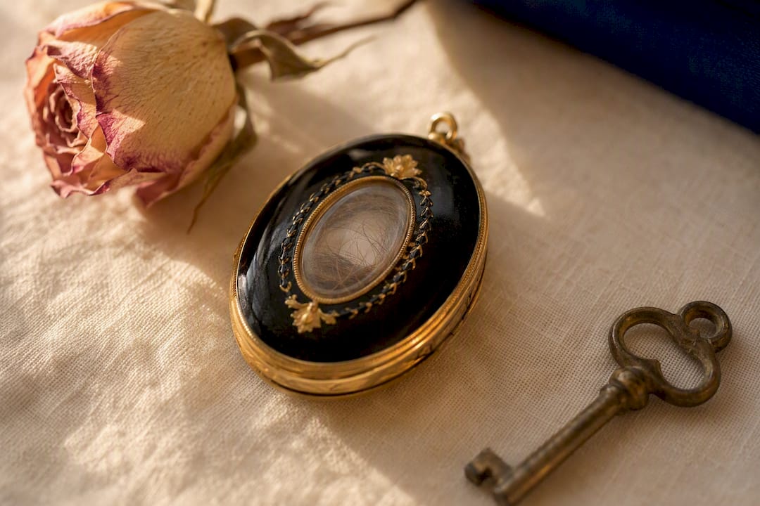 Open mourning locket showing hair compartment