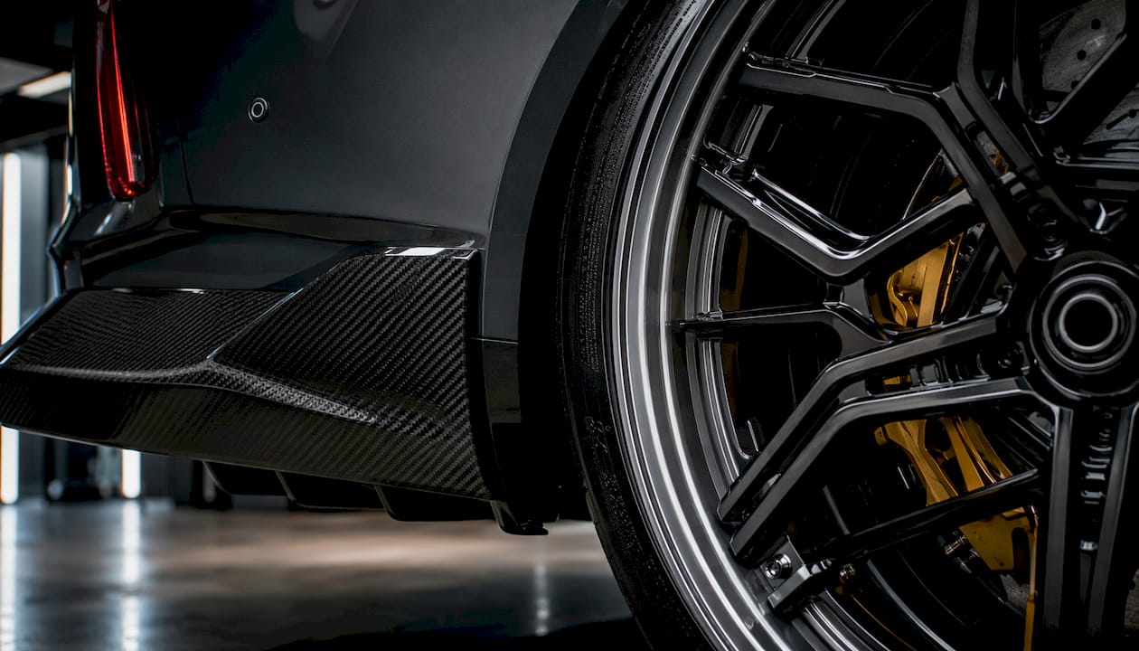 Macro shot of forged wheel groove and carbon diffuser