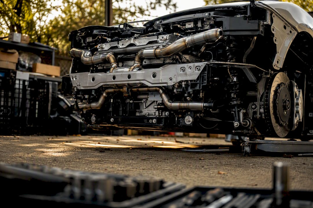 Titanium exhaust undercarriage rear chassis detail