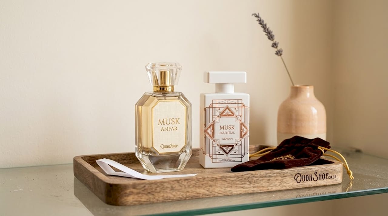 Oud and musk perfume bottles on shelf