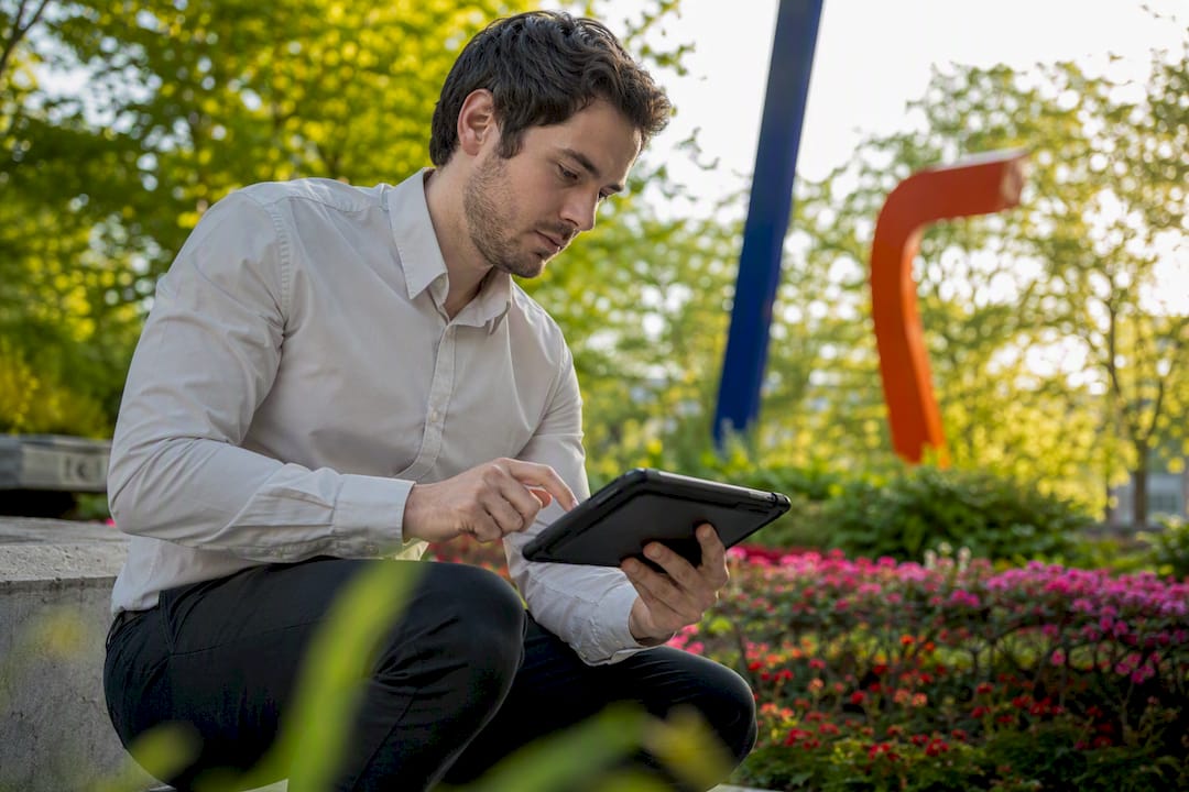 Person testing rugged defence hardware tablet