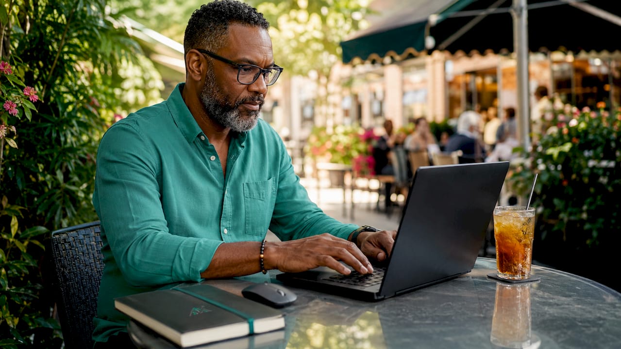 Businessman testing website speed on laptop
