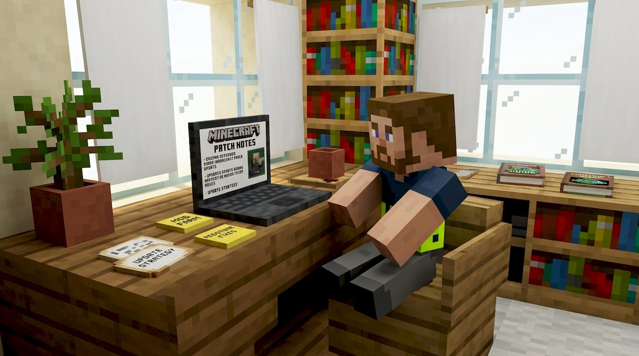 Person reviewing Minecraft updates at home office