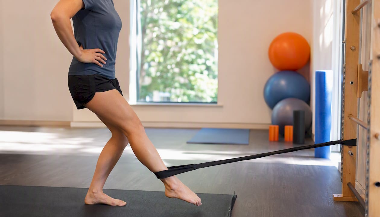 Hip flexor eccentric strengthening with resistance band