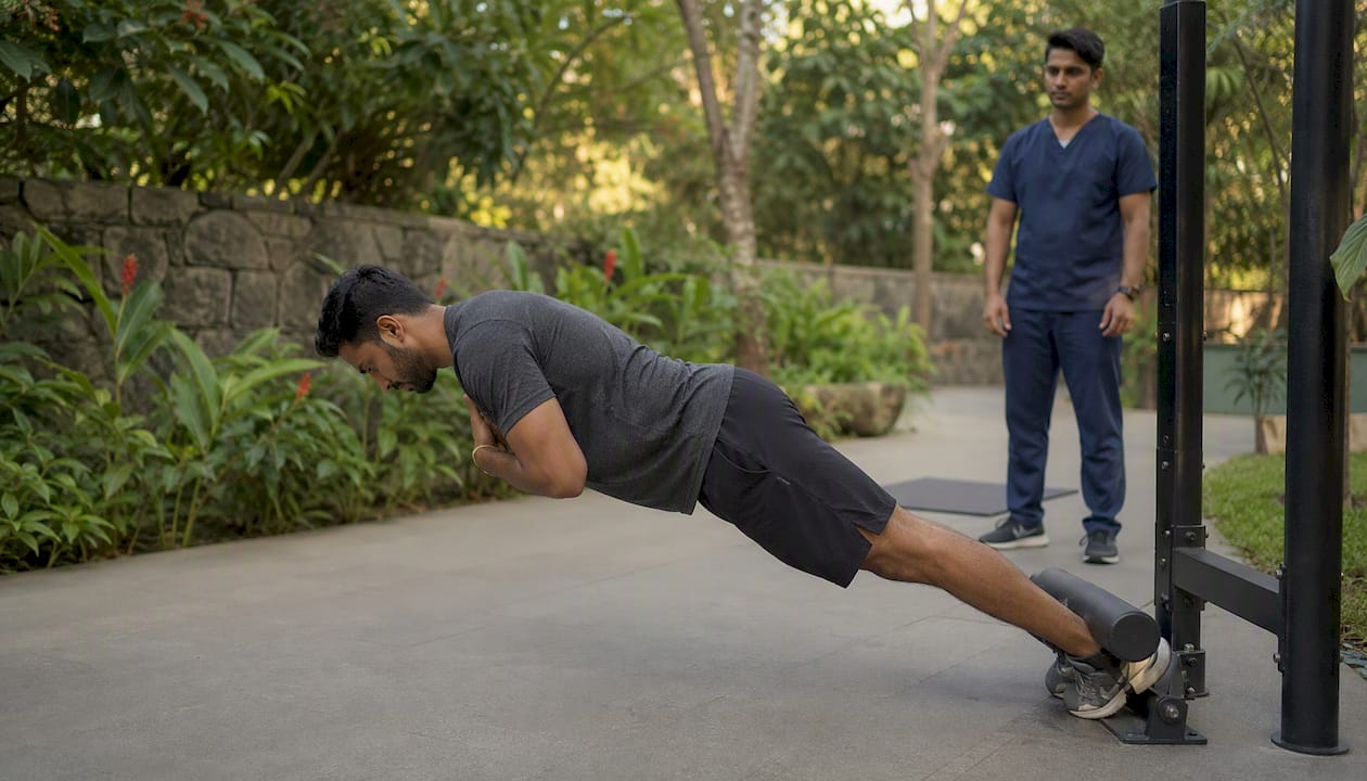 Patient doing Nordic hamstring curl exercise