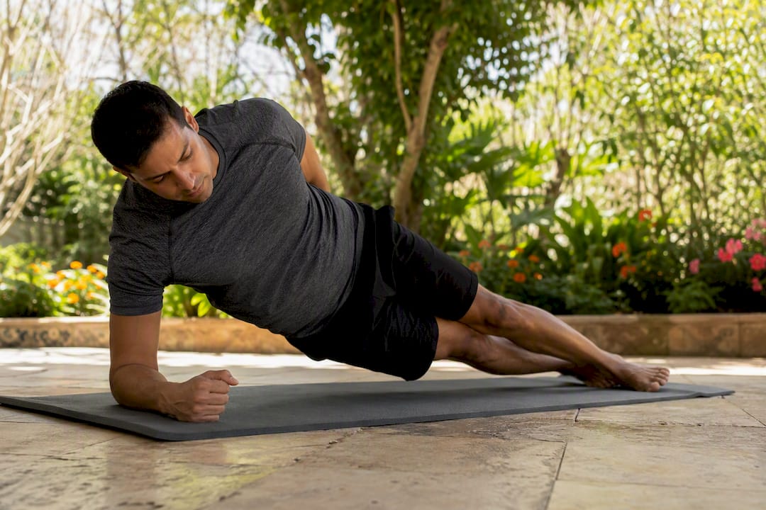 Athlete doing Copenhagen plank exercise