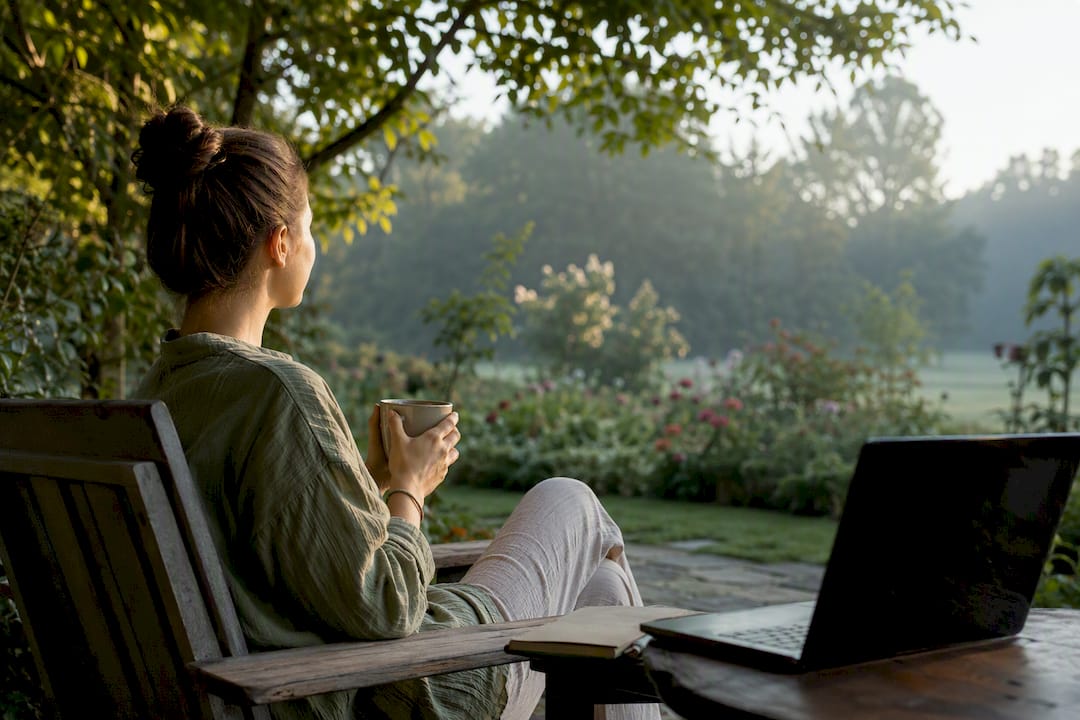 Person looking away from screen practicing eye break