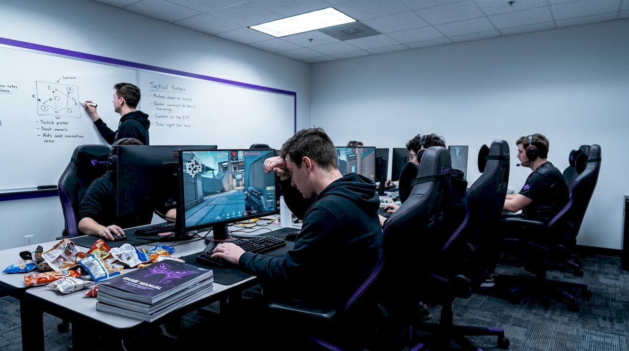 Team scrim session in esports practice room