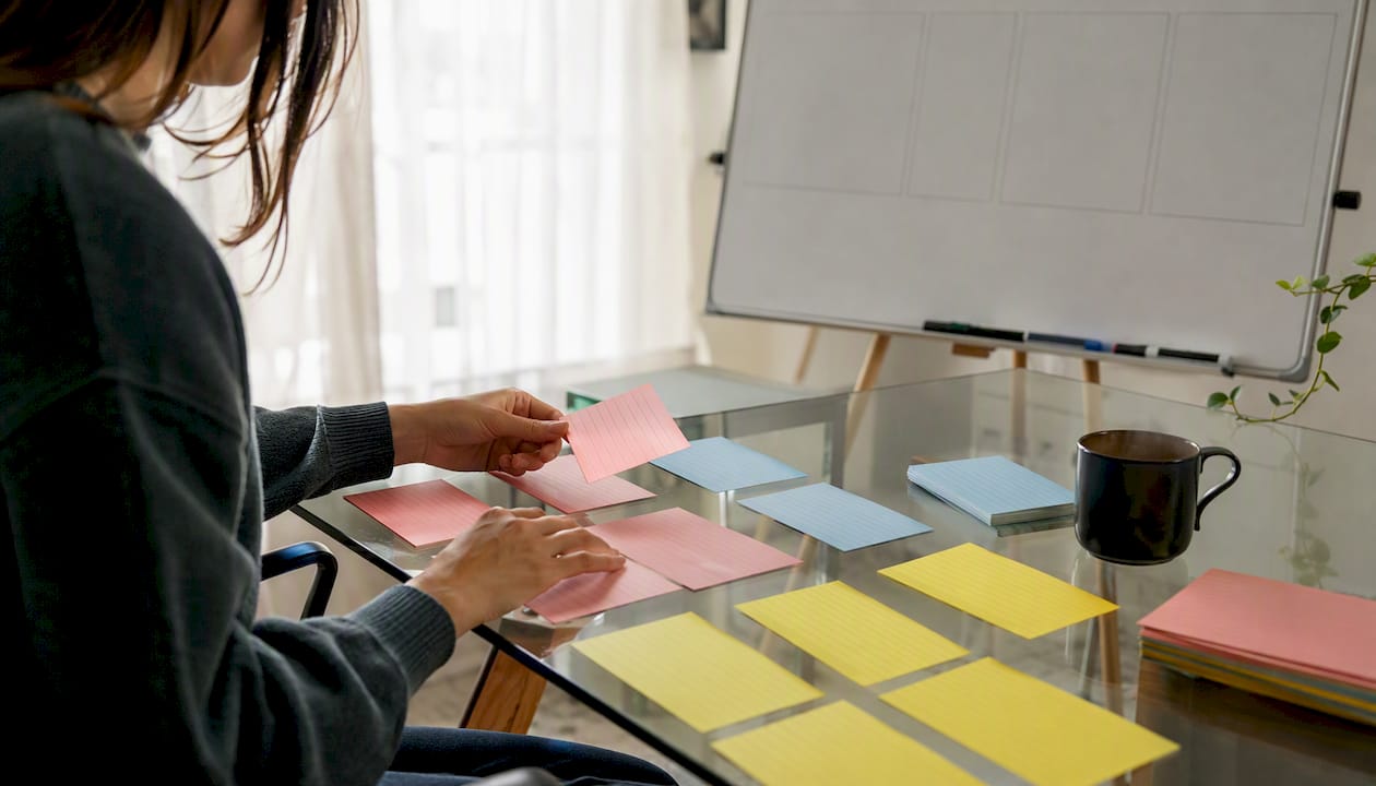 Hands sorting app user cohort index cards
