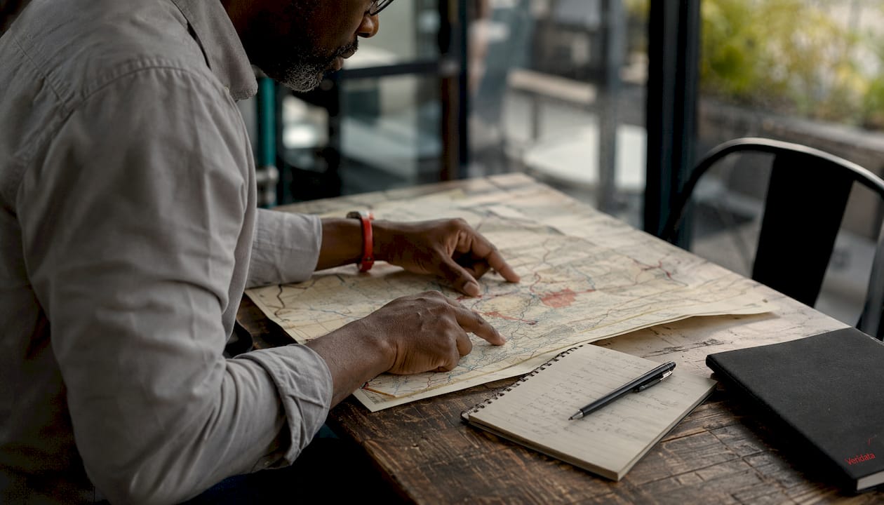 Hands analyzing sampling frame map