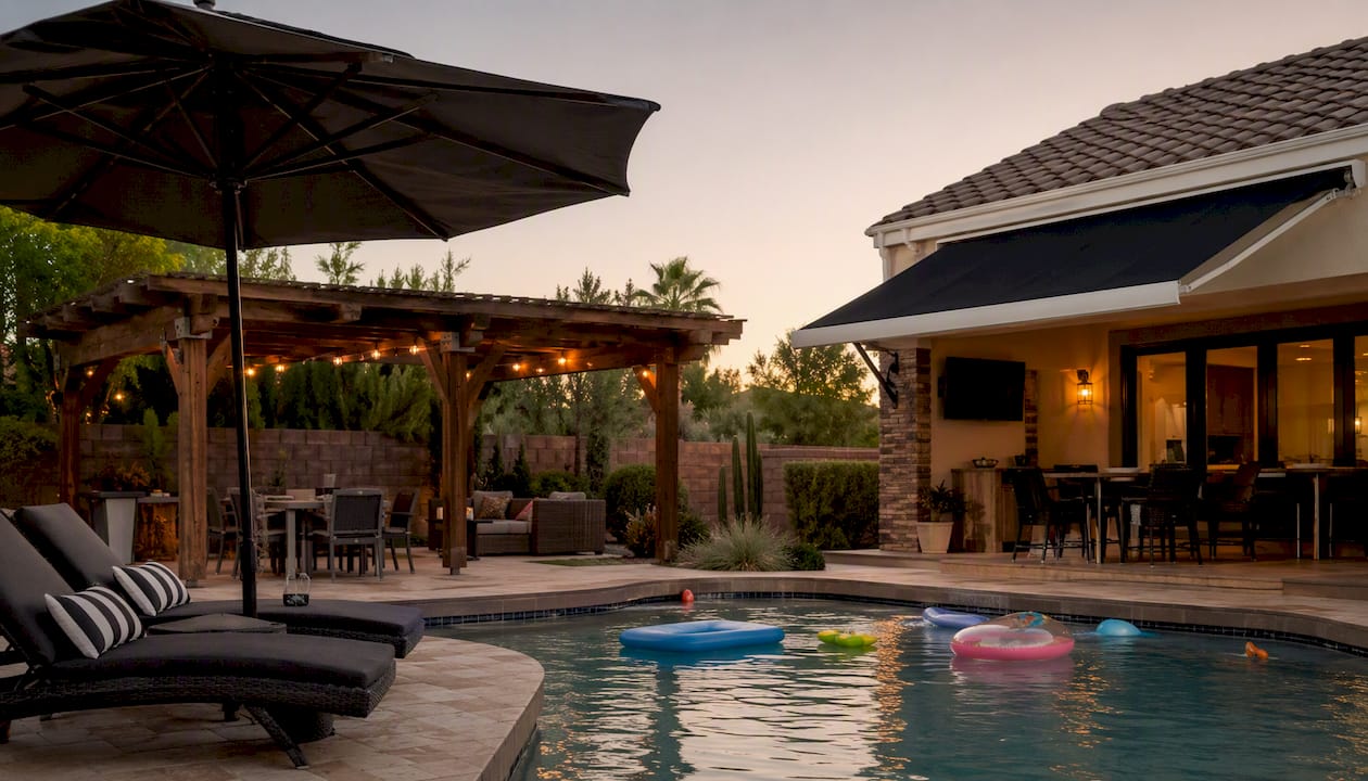Backyard with multiple pool shade solutions