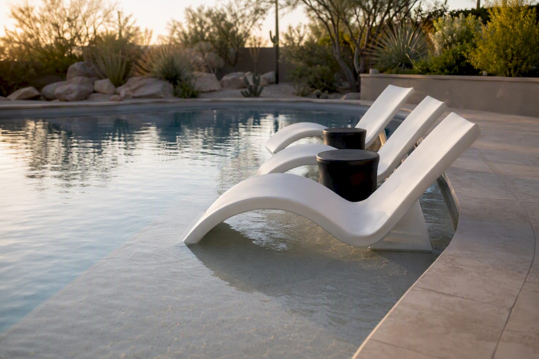 Shallow Baja shelf with lounge chairs in pool