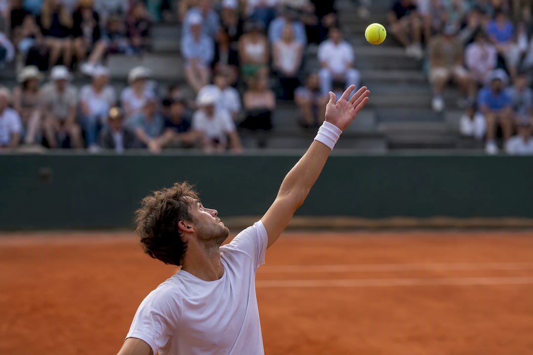Player serving in a live tennis match