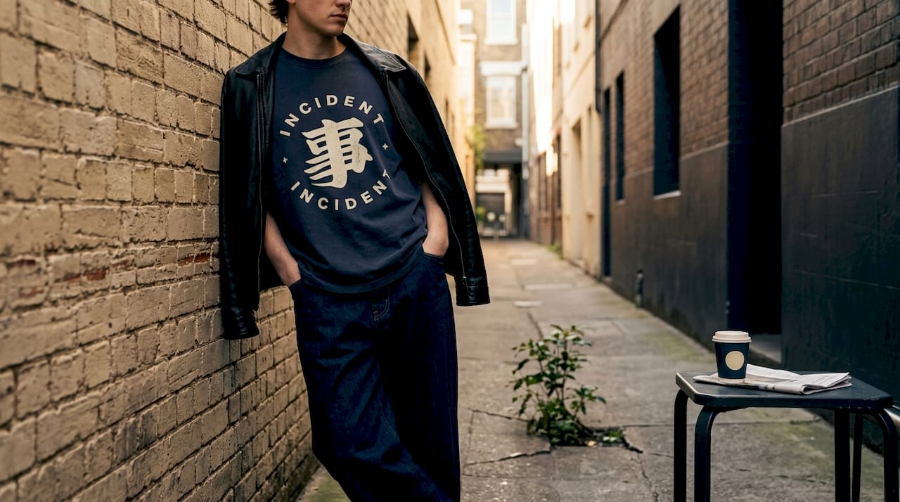 Person in off-duty casual outfit on street