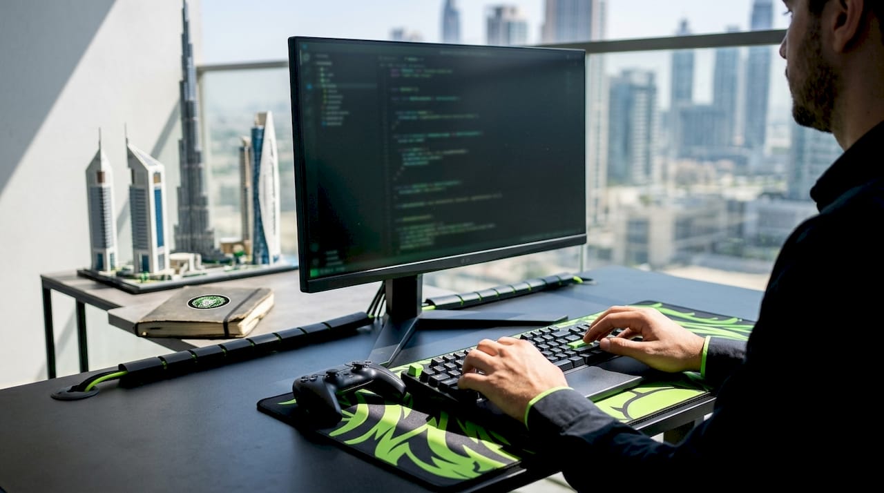 Developer workspace with UAE gaming tech elements