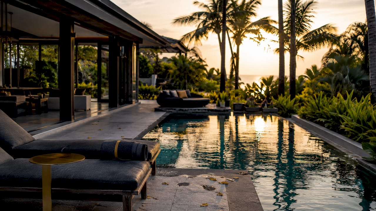 Luxury private villa exterior with pool and terrace
