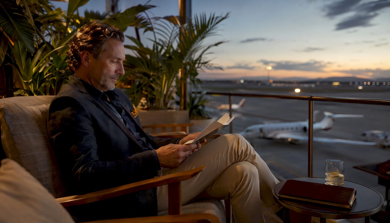 Traveler relaxing in VIP airport lounge