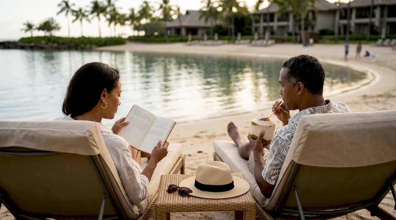 Couple relaxing at beach resort after wedding