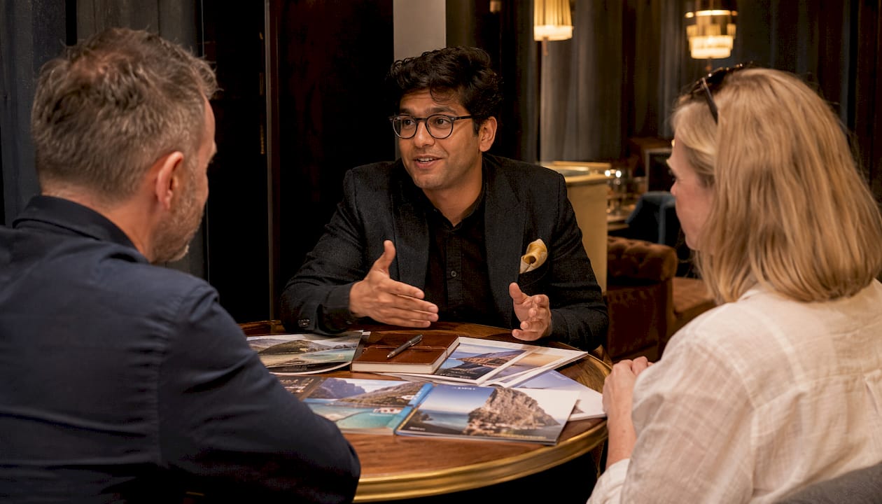 Boutique travel consultant meeting luxury clients