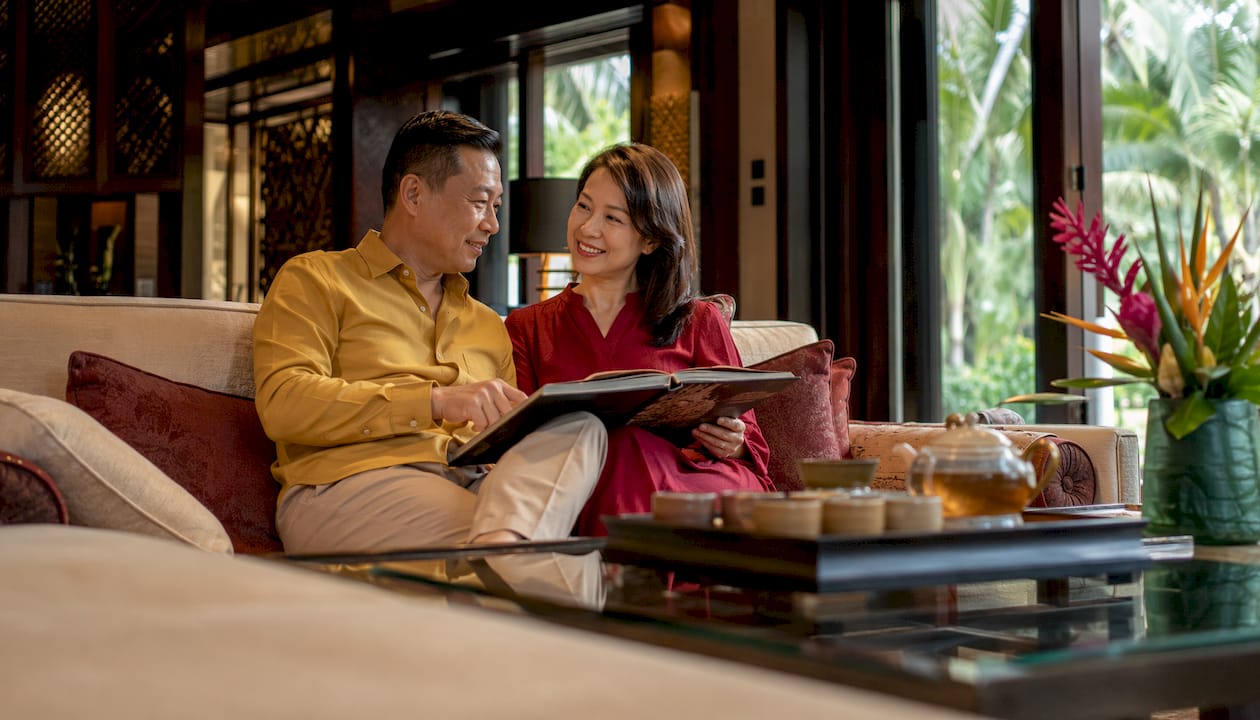 Couple enjoying dining area in luxury villa
