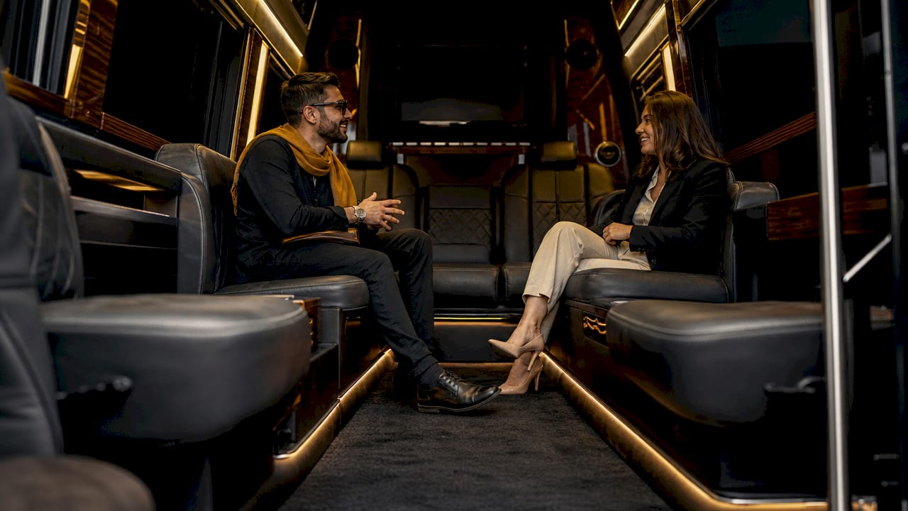 Luxury Sprinter van interior with lounge seating