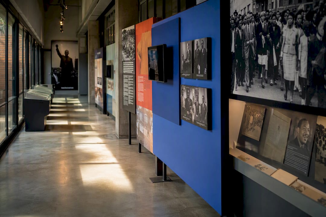 Exhibit corridor with documentary panels at Apartheid Museum