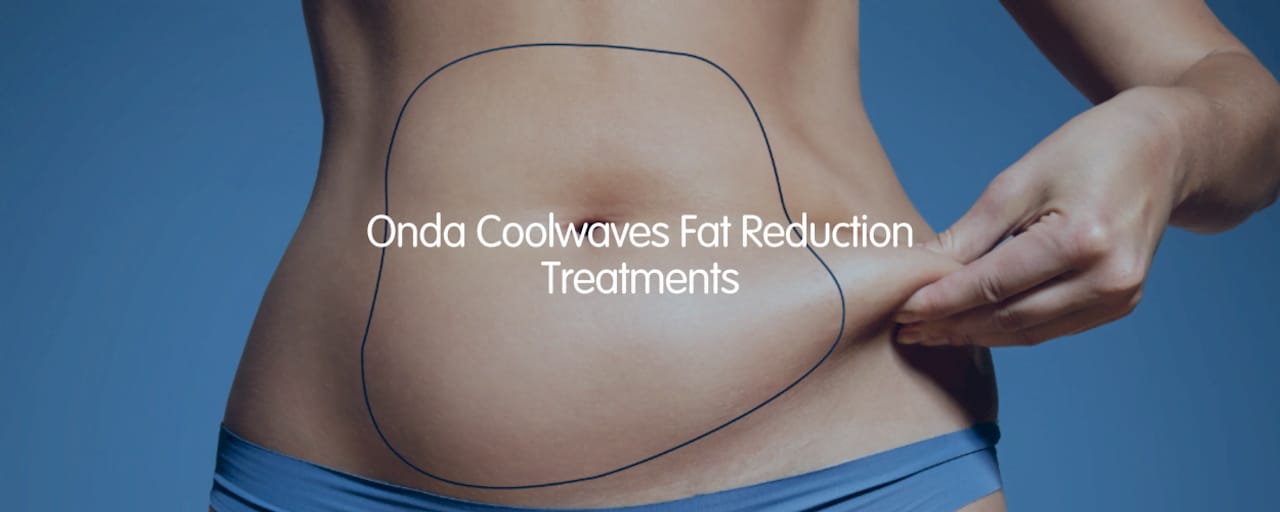 Client learning about Onda Coolwaves treatment