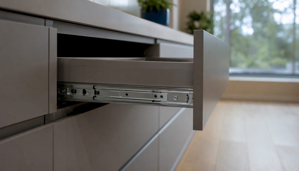 Side view of drawer slide hardware in kitchen