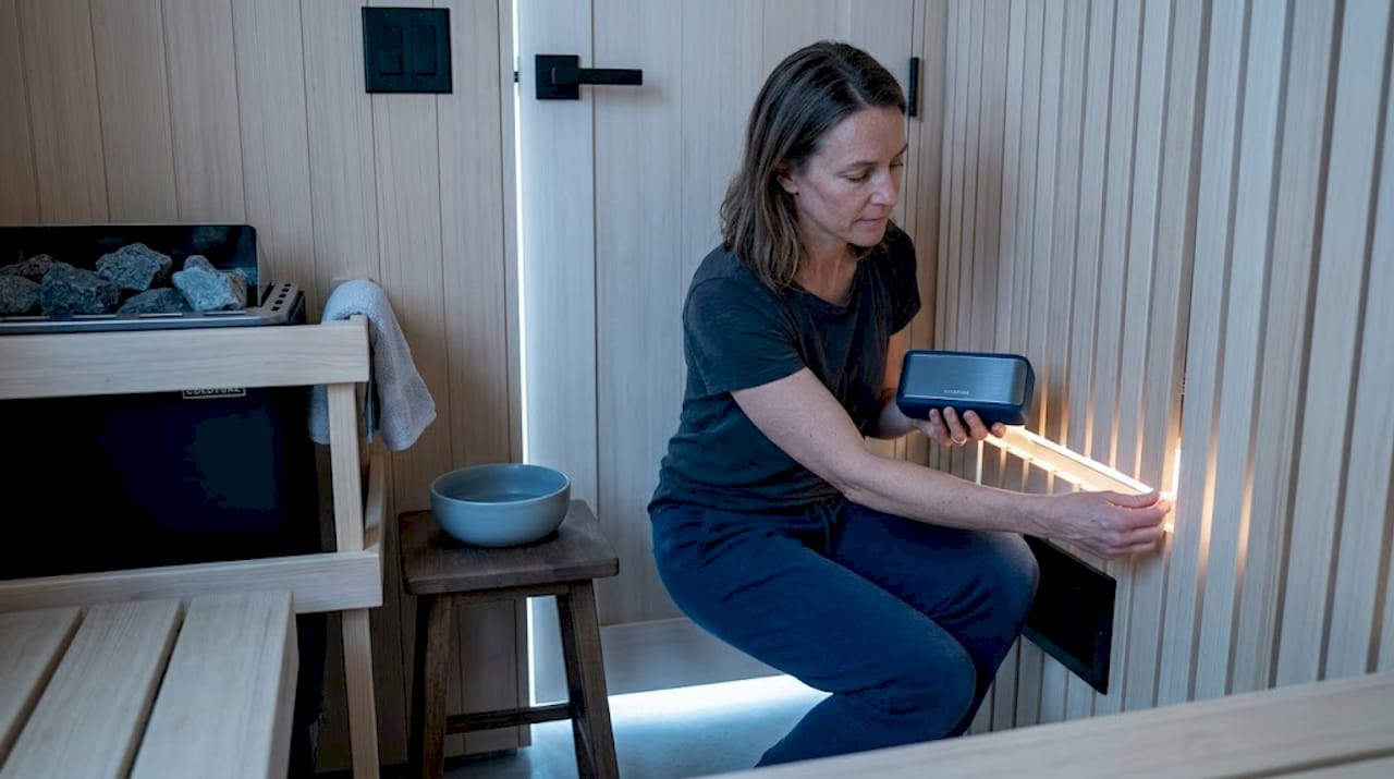 Adjusting LED lighting and speaker in sauna