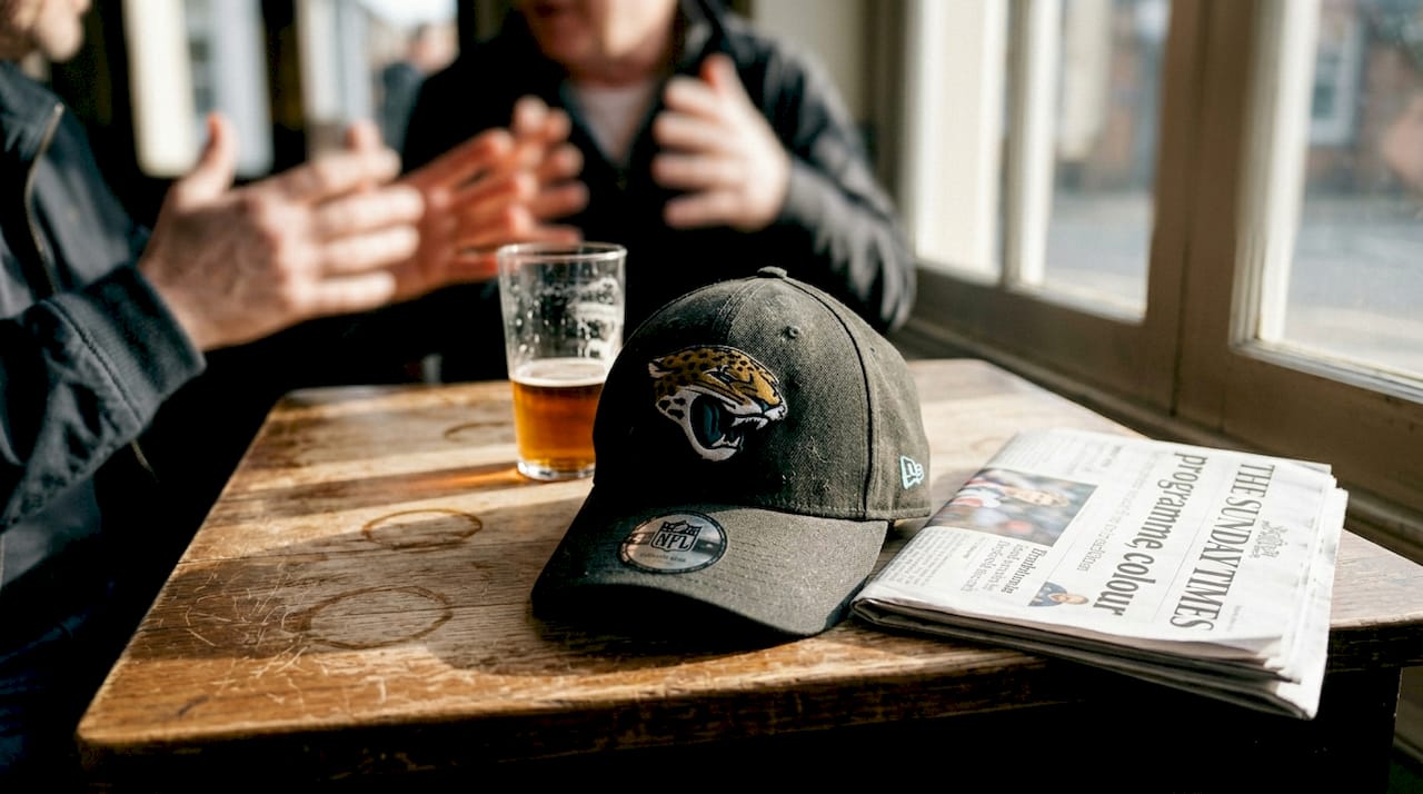 Authentic NFL cap on pub table