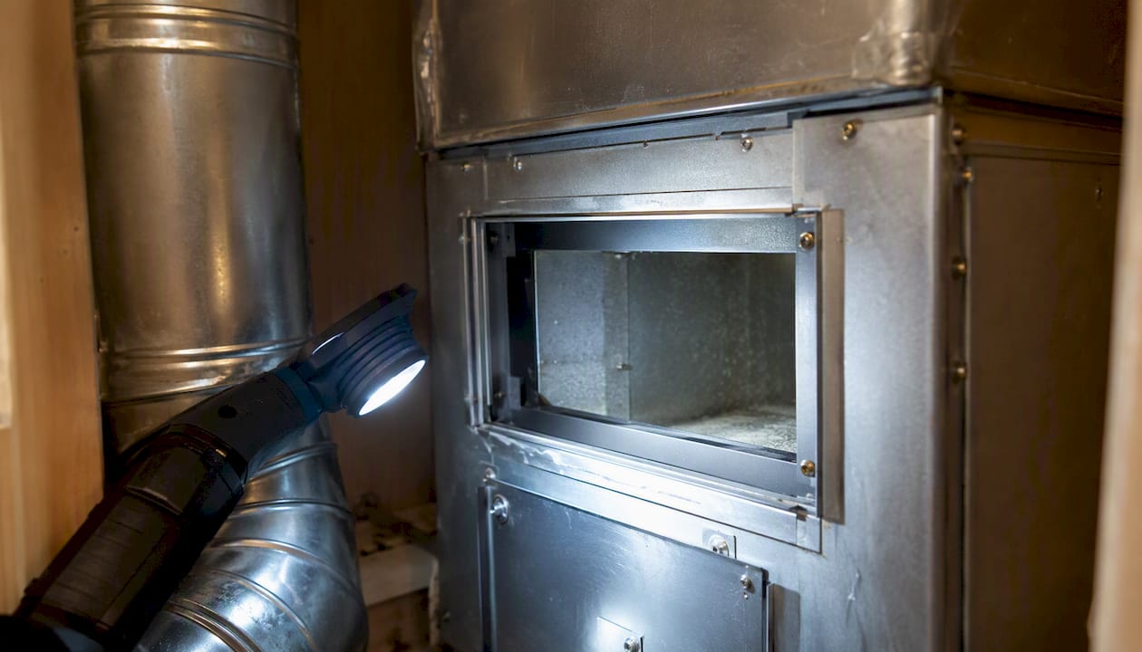Open duct plenum filter slot in utility closet
