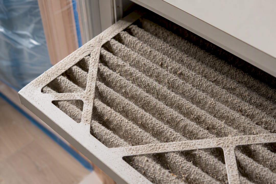 Air filter loaded with construction dust