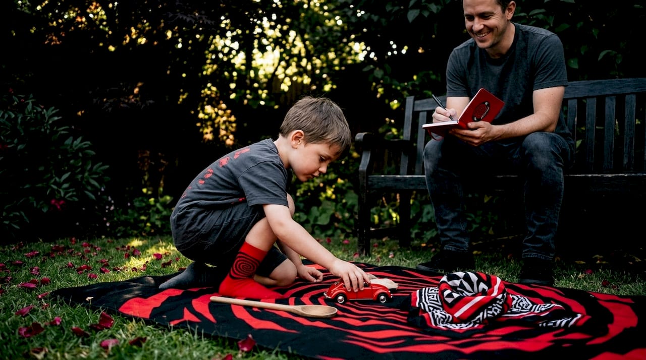 Child picking household props for storytelling