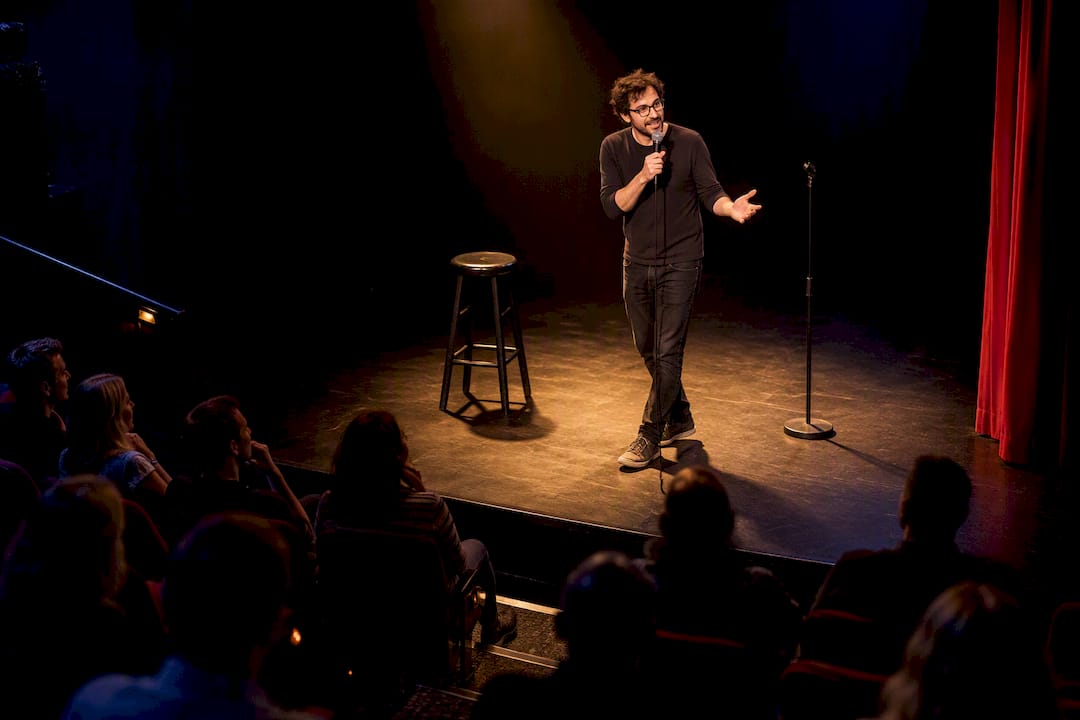 Audience watching extended live comedy performance