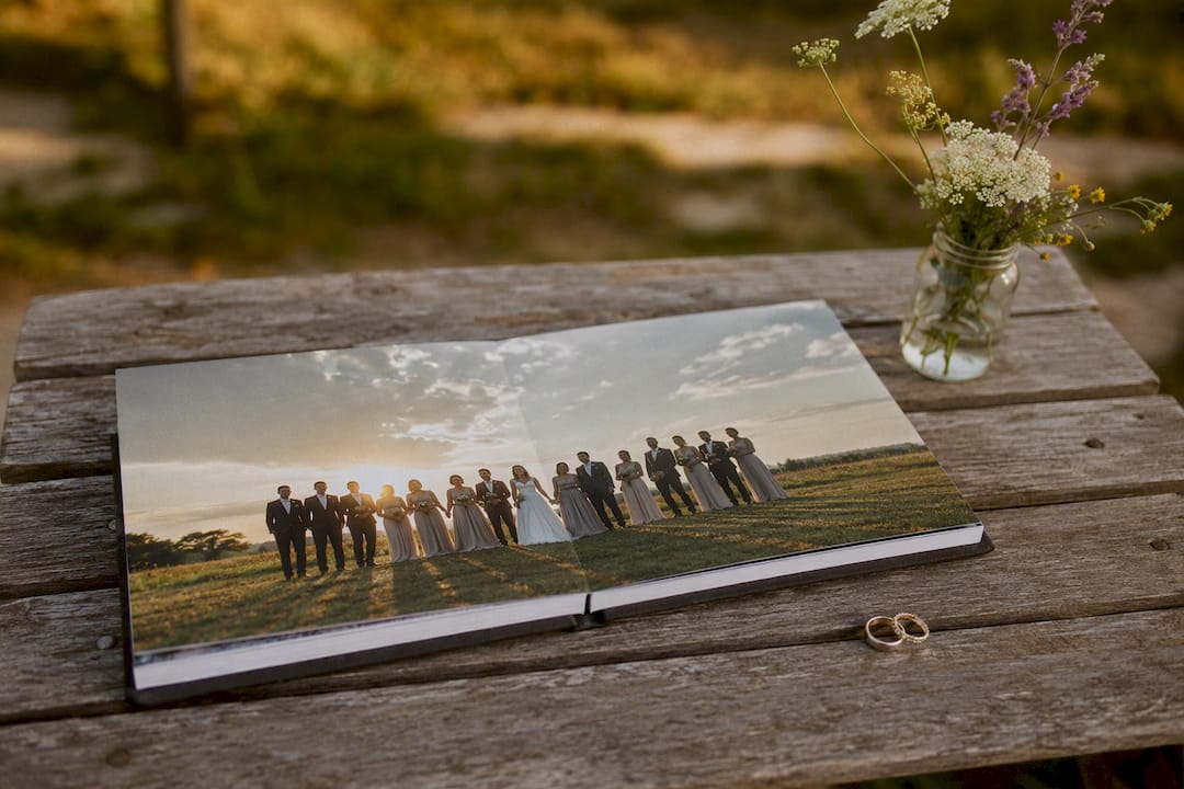 Wedding photo album opened flat showing full-spread image