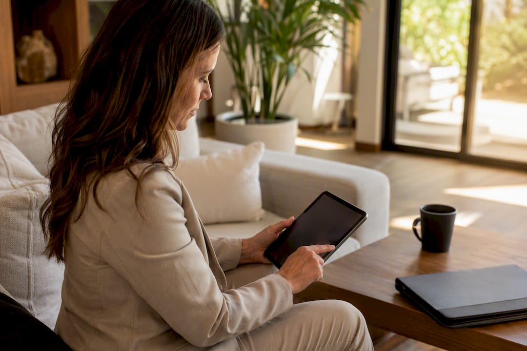 Agent preparing ROV comps on tablet after low appraisal