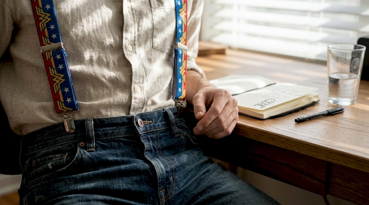 Close-up of superhero suspenders hardware and materials