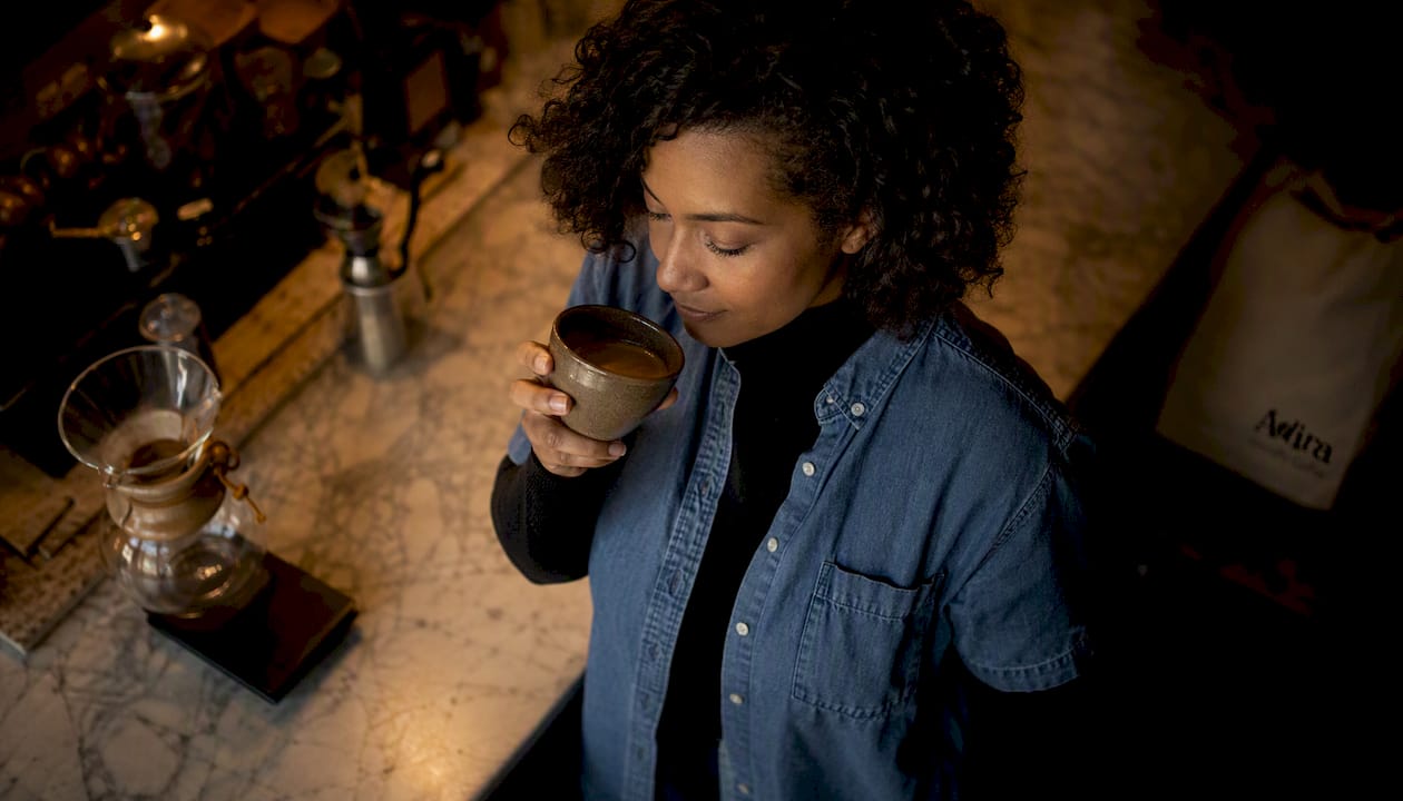 Barista tasting medium roast espresso