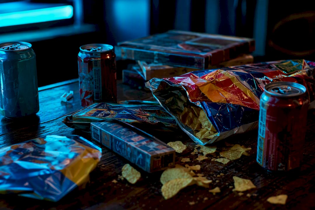 Close-up of 1980s peanut butter snack wrappers on wood table