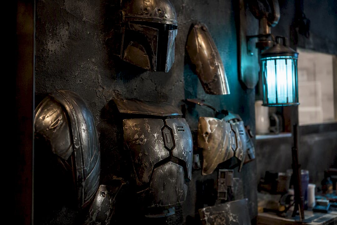 Close-up of weathered Mandalorian armor dents