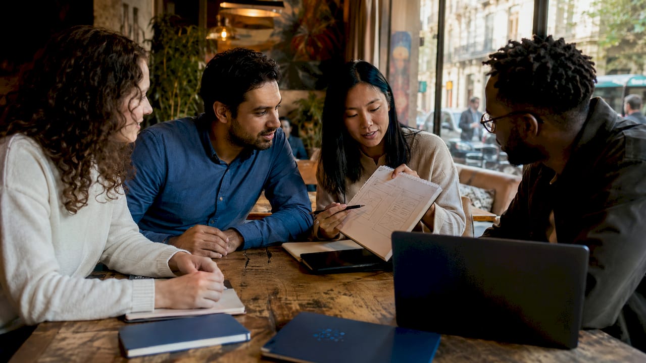 Diverse team collaborating nearshore workflow