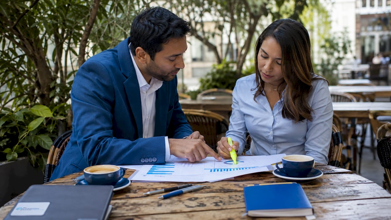 HR team discussing recruitment metrics