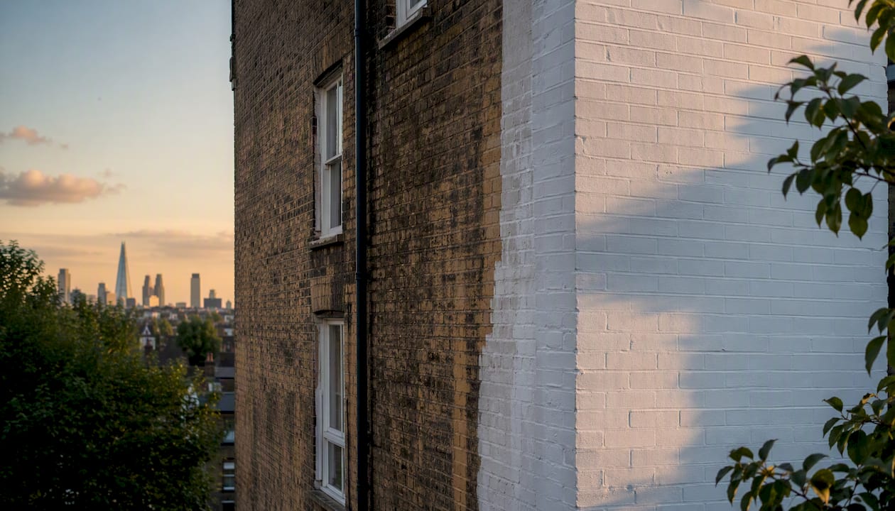 Freshly painted exterior masonry wall in London